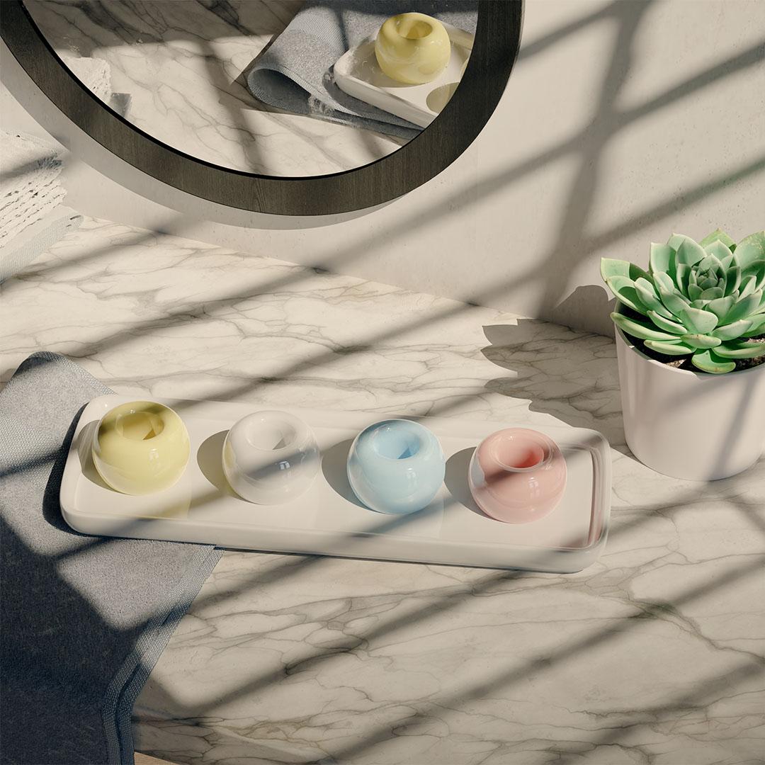 Elikai product detail with pastel accessories on marble